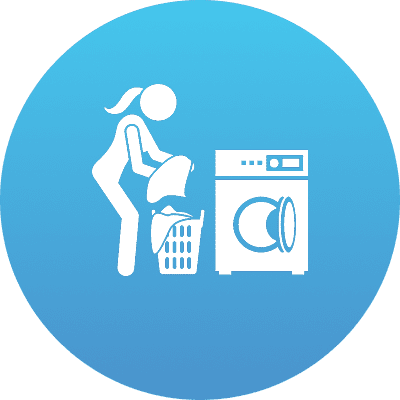 Person loading laundry into washing machine icon.