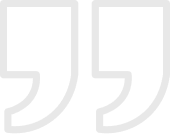 Large white quotation marks on black background.
